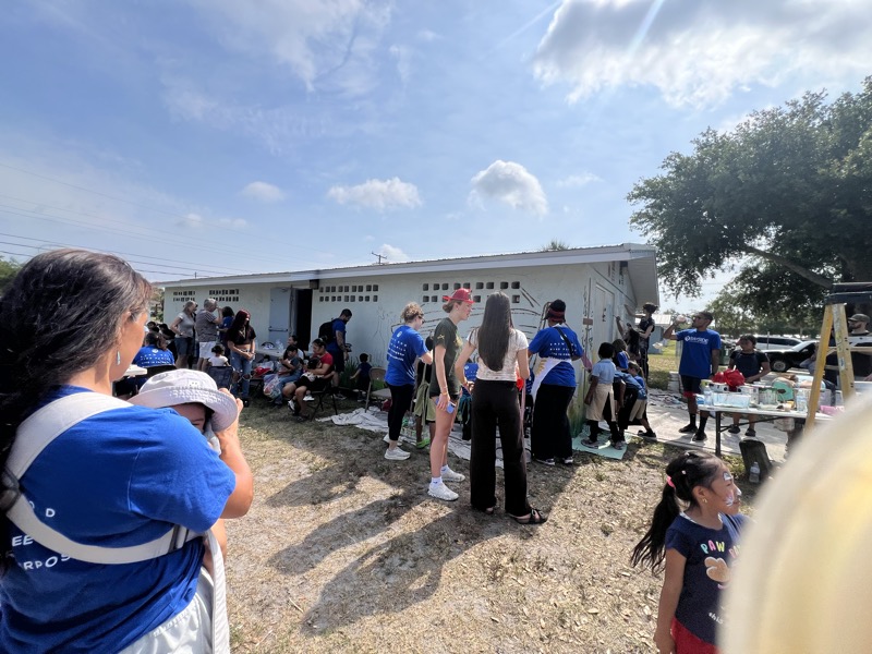Volunteers serving a local community on a FireSnatchers-hosted serve day