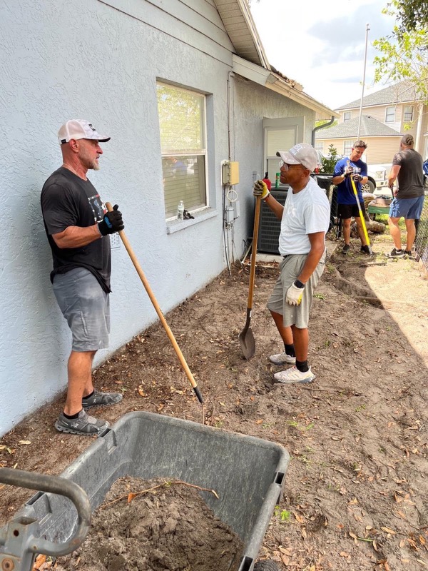 James serving directly alongside a local ministry team